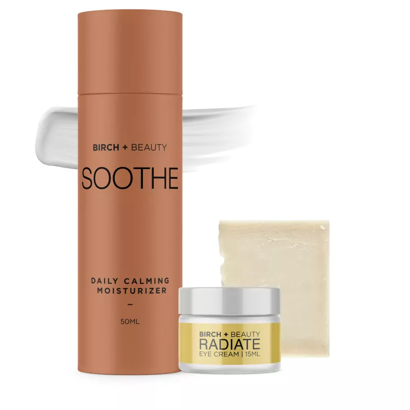 Birch + Beauty skincare products, moisturizer and eye cream, on a white background.
